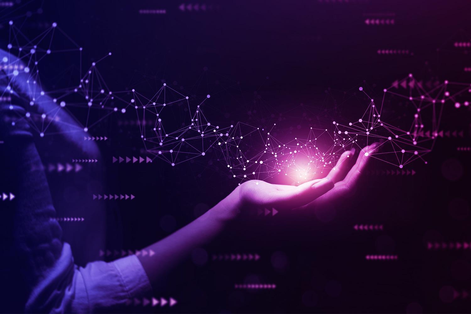 A hand interacting with a connected digital technology network